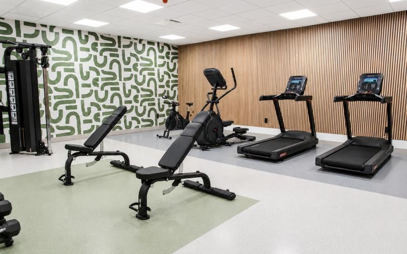 a room with treadmills