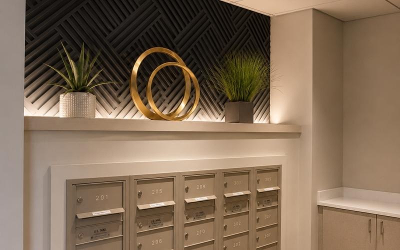 a kitchen with a black wall